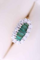 Lot 2071 - EMERALD AND DIAMOND CLUSTER RING set with five...