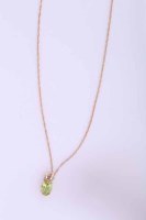 Lot 2082A - FOURTEEN CARAT GOLD PERIDOT PENDANT set with...