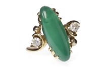 Lot 537 - PASTE DRESS RING set with an elongated oval...