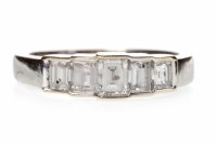 Lot 554 - DIAMOND FIVE STONE RING set with five...