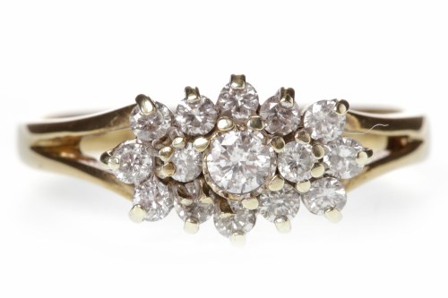 Lot 578 - NINE CARAT GOLD DIAMOND CLUSTER RING set with...
