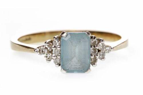 Lot 688 - NINE CARAT GOLD BLUE TOPAZ AND DIAMOND RING...