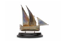 Lot 848 - CONTINENTAL WHITE METAL MODEL OF A SAILING...