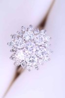 Lot 2115 - IMPRESSIVE DIAMOND CLUSTER RING the pierced...