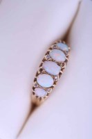 Lot 2128 - VICTORIAN OPAL RING set with five graduated...