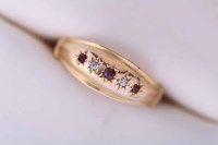 Lot 2134 - RUBY AND DIAMOND FIVE STONE RING set with...