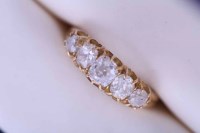 Lot 2155 - DIAMOND FIVE STONE BOAT SHAPED RING set with a...