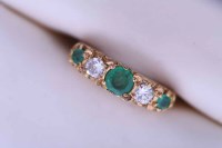 Lot 2157 - EMERALD AND DIAMOND FIVE STONE RING set with...