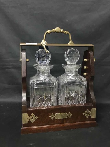 Lot 60 - TWO BOTTLE TANTALUS wooden tantalus with two...