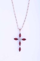 Lot 2160A - GARNET AND DIAMOND CROSS PENDANT set with four...