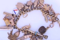 Lot 2167 - GOLD CHARM BRACELET the belcher link chain...