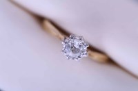 Lot 2173 - DIAMOND SOLITAIRE RING with an old cut stone...