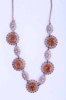 Lot 2179 - CITRINE SET NECKLET set with five round...