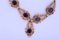 Lot 2182 - GARNET NECKLET with five oval stones in a...