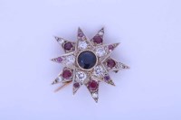 Lot 2183 - SAPPHIRE, DIAMOND AND RUBY STAR SHAPED BROOCH...