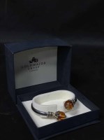Lot 45 - SILVER AND AMBER BANGLE along with a silver...