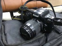 Lot 194 - NIKON F50 CAMERA with strap and in camera bag,...