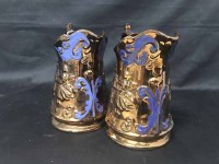 Lot 236 - THREE COPPER LUSTRE JUGS along with a copper...