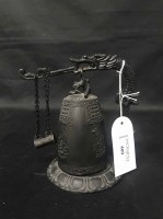 Lot 409 - CHINESE BRONZE BELL with handle decorated with...