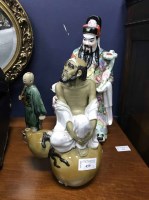 Lot 459 - THREE CHINESE CERAMIC FIGURES