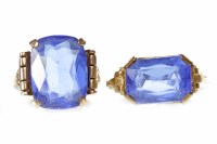 Lot 100 - TWO ART DECO PASTE DRESS RINGS each set with a...