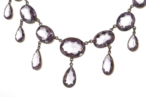 Lot 105 - CONTINENTAL AMETHYST NECKLET set with...