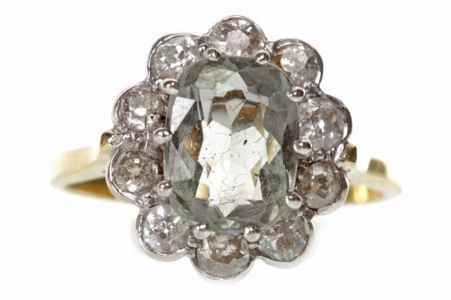 Lot 144 - GEM AND DIAMOND CLUSTER RING set with a...