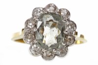 Lot 144 - GEM AND DIAMOND CLUSTER RING set with a...