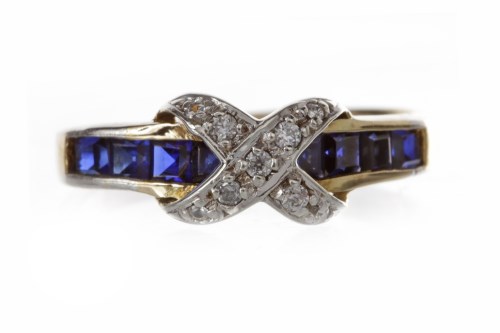 Lot 216 - GEM SET DRESS RING formed by a band with a row...