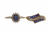Lot 254 - SAPPHIRE AND DIAMOND CLUSTER RING set with a...
