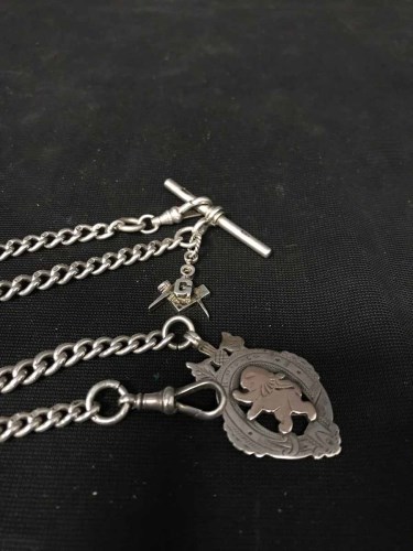 Lot 4 - TWO SILVER ALBERT CHAINS one with masonic fob...