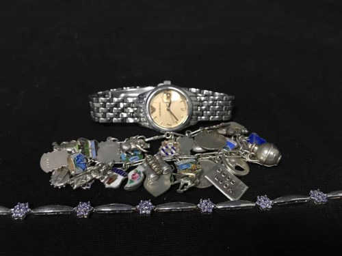 Lot 8 - LOT OF SILVER JEWELLERY including a charm...