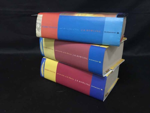 Lot 53 - THREE HARRY POTTER BOOKS including two first...
