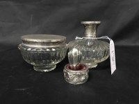 Lot 189 - TWO CONTINENTAL SILVER TOPPED JARS together...