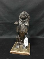 Lot 319 - BRONZED FIGURE OF A SEATED LION