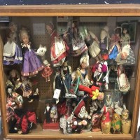 Lot 367 - DISPLAY CABINET WITH DOLLS OF THE WORLD IN...