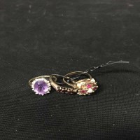 Lot 534 - GROUP OF THREE RINGS including red and purple...