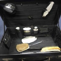 Lot 548 - BLACK LEATHER TRAVELLING DRESSING CASE with...