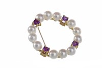 Lot 232 - PEARL AND AMETHYST BROOCH of open circular...