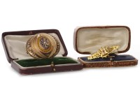 Lot 511 - TWO VICTORIAN BROOCHES one of oval form, with...