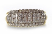 Lot 526 - DIAMOND DRESS RING with two central rows of...