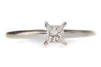Lot 537 - DIAMOND SOLITAIRE RING with a four claw set...