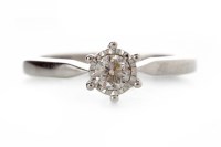 Lot 541 - DIAMOND SOLITAIRE RING set with a round...