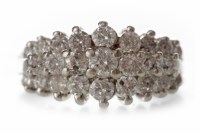 Lot 564 - DIAMOND DRESS RING with three rows of...