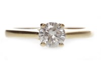 Lot 645 - DIAMOND SOLITAIRE RING with a four claw set...