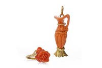 Lot 686 - EIGHTEEN CARAT GOLD CORAL PENDANT in the form...