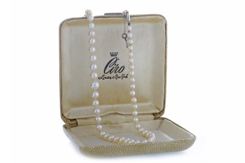 Lot 688 - PEARL NECKLACE formed by graduated pearls, the...