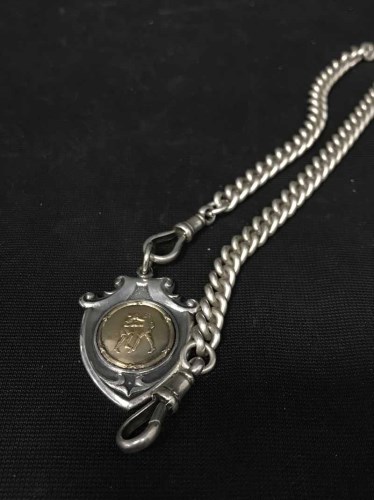 Lot 14 - SILVER ALBERT CHAIN with silver fob decorated...