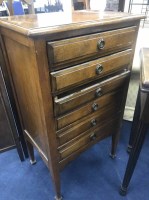 Lot 327 - OAK MUSIC CABINET fitted with drawers