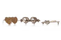Lot 513 - THREE VICTORIAN SWEETHEART BROOCHES comprising...
